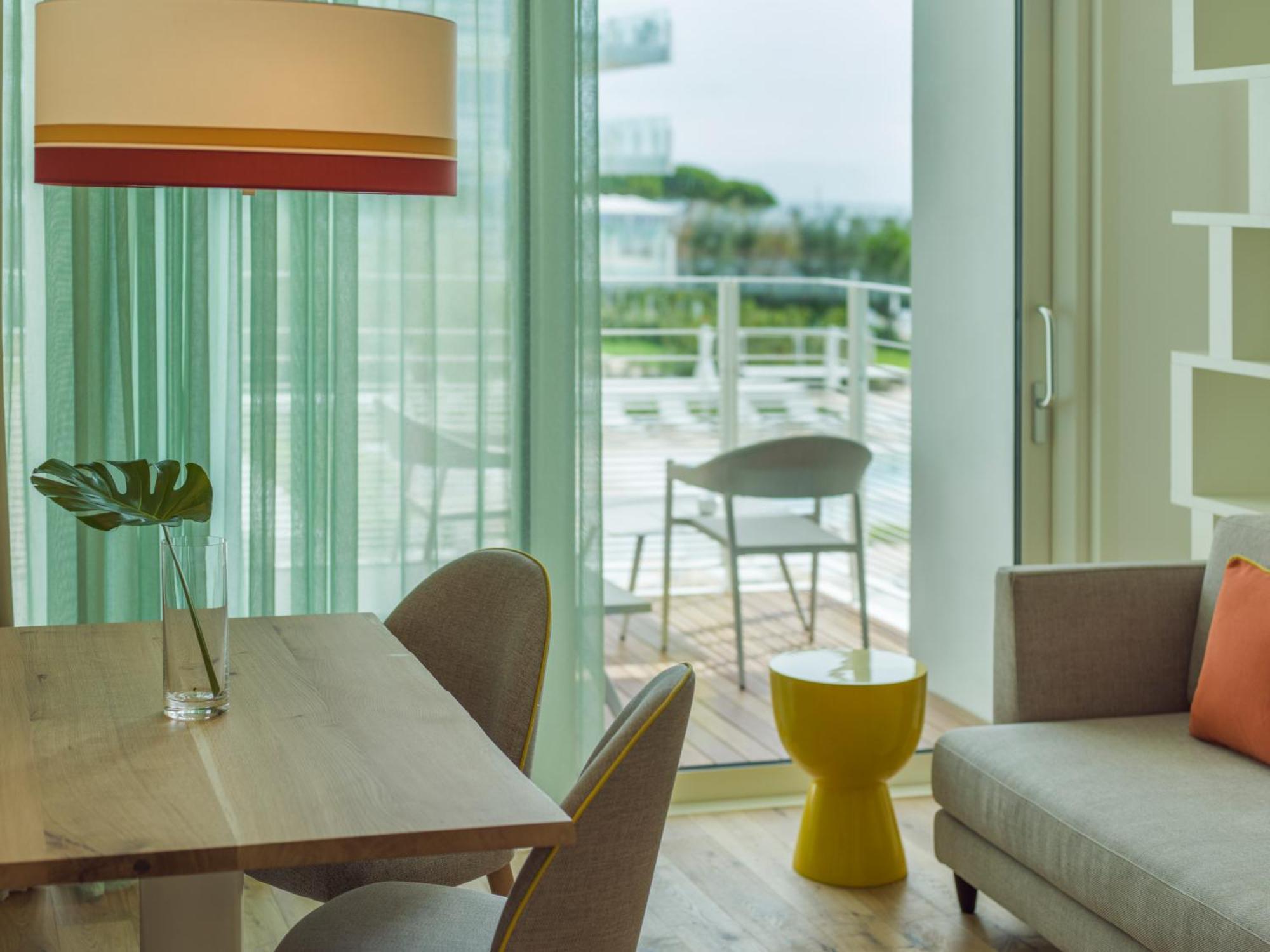 Falkensteiner Hotel & Spa Jesolo Room photo A living room at the W South Beach