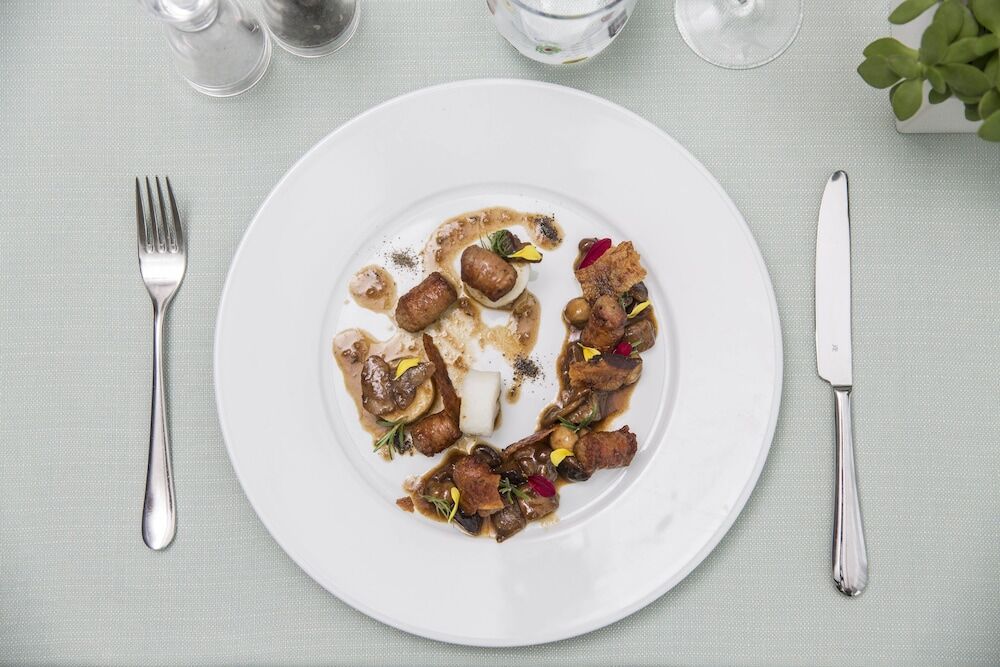 Falkensteiner Hotel & Spa Jesolo Exterior photo A plate of food